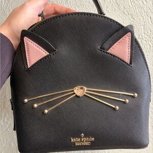 Kate Spade Black Cat Ear Backpack with Pink and Gold Accents